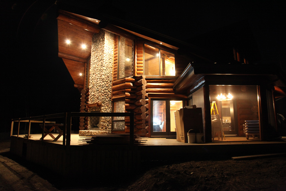 A log home at night