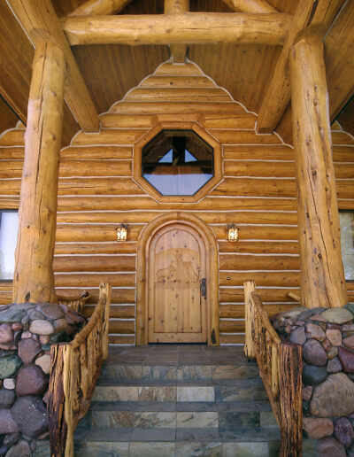 A front door of a log home